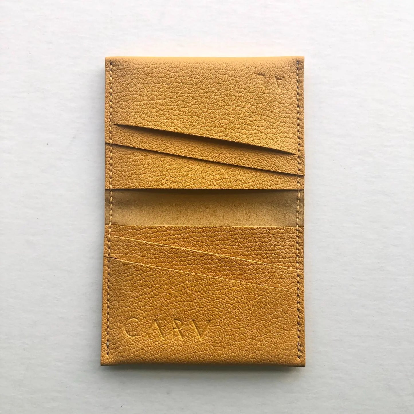 Mustard yellow leather card wallet by CARV in minimalist design with personalisation
