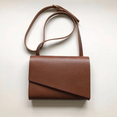CARV tan leather handbag in minimalist style with full grain leather