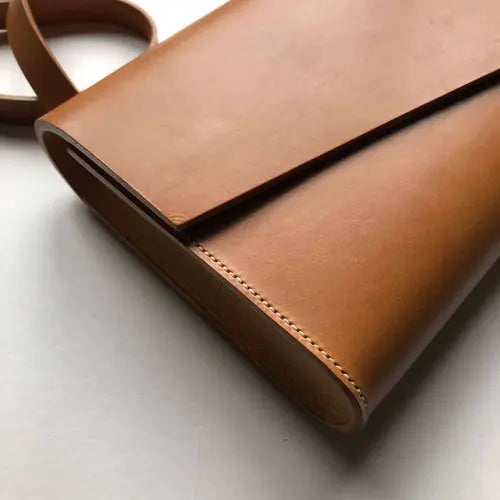 CARV tan leather handbag in minimalist style with smooth sand leather