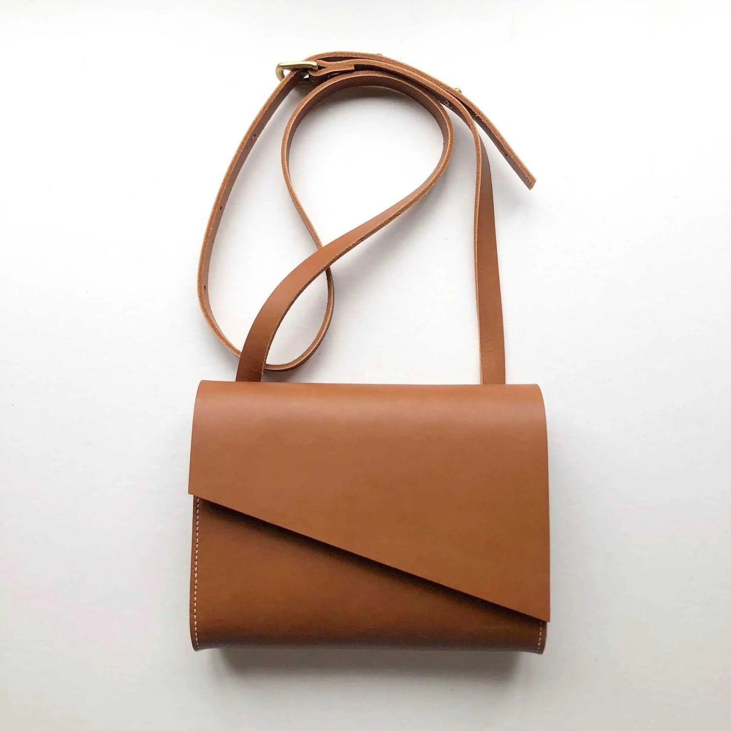 CARV pioneer mini crossbody leather handbag in matte tan